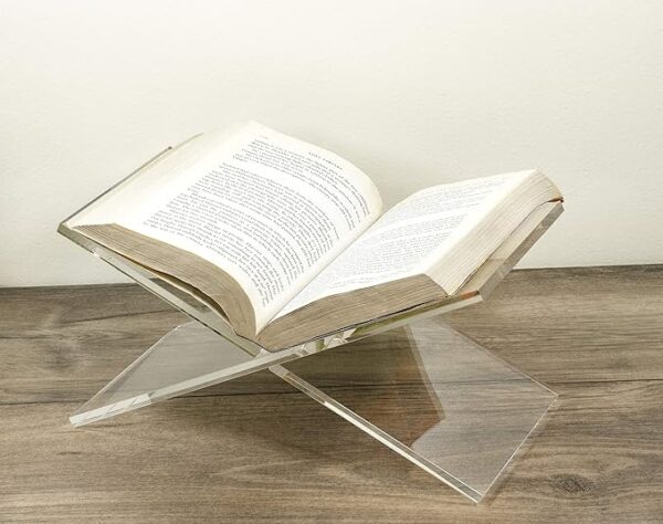 clear acrylic book holder on book